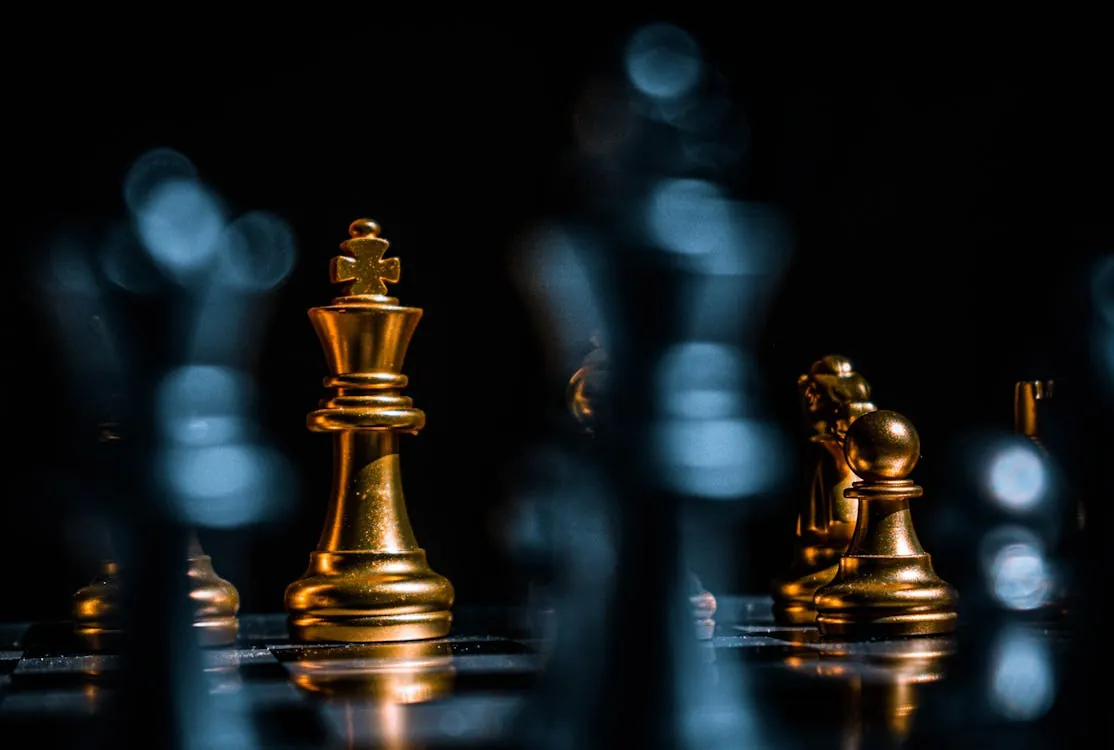 Gold chess pieces symbolizing the gold standard in artificial intelligence evaluation.