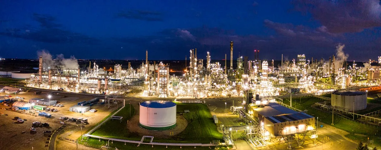 Oil refinery at night showing industrial energy infrastructure