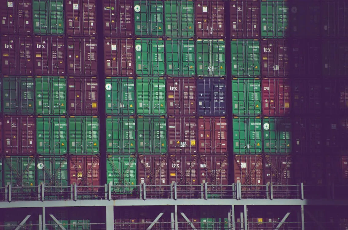 A developer scanning containers for vulnerabilities on a large monitor.