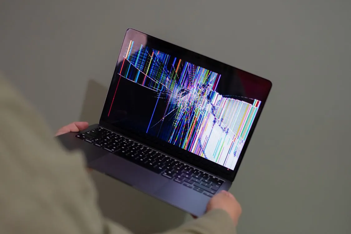 Developer reviewing unexpected billing errors on a laptop