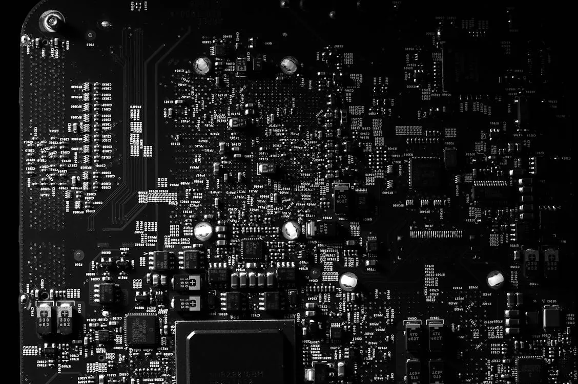 Close-up of a dense printed circuit board with electronic components