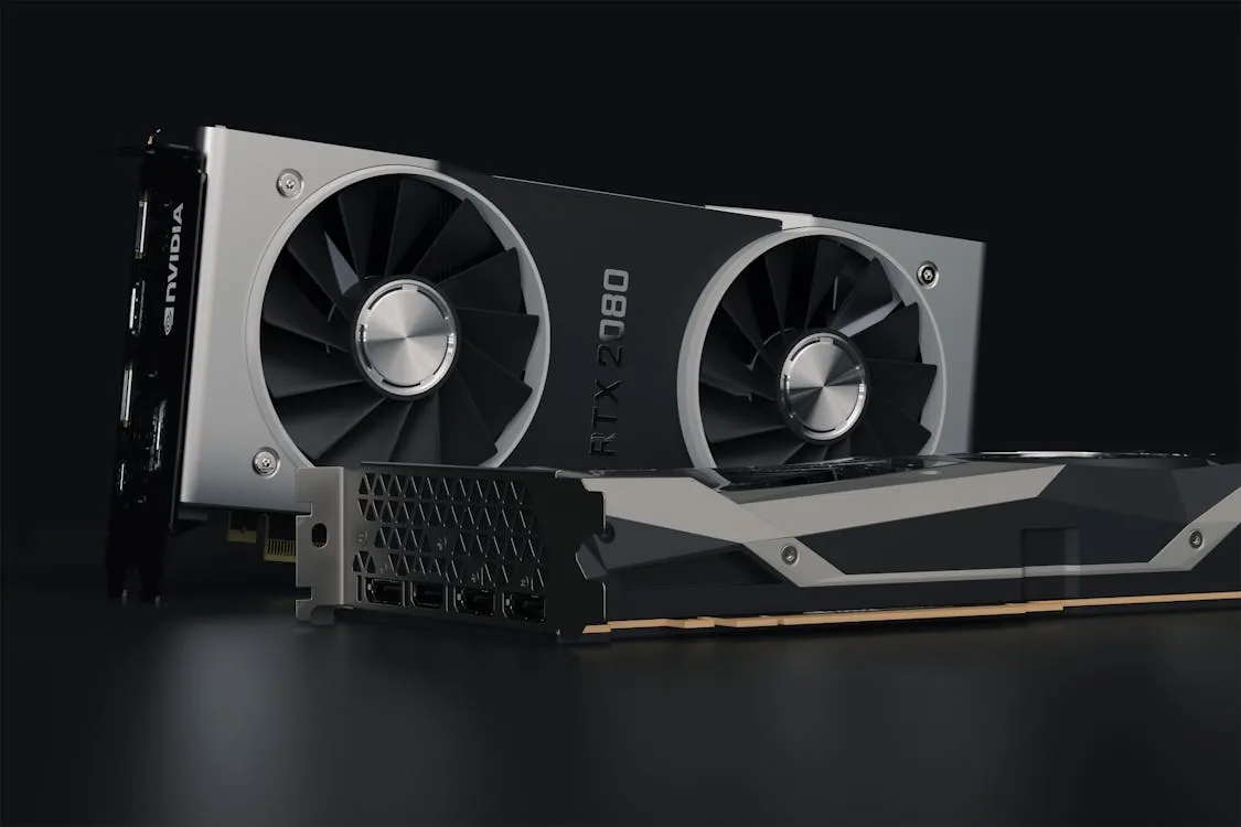 This image shows a high-end NVIDIA RTX 2080 graphics card against a dark background, highlighting its dual cooling fans and sleek design. It would be suitable for articles about gaming technology, computer hardware, or digital graphics.