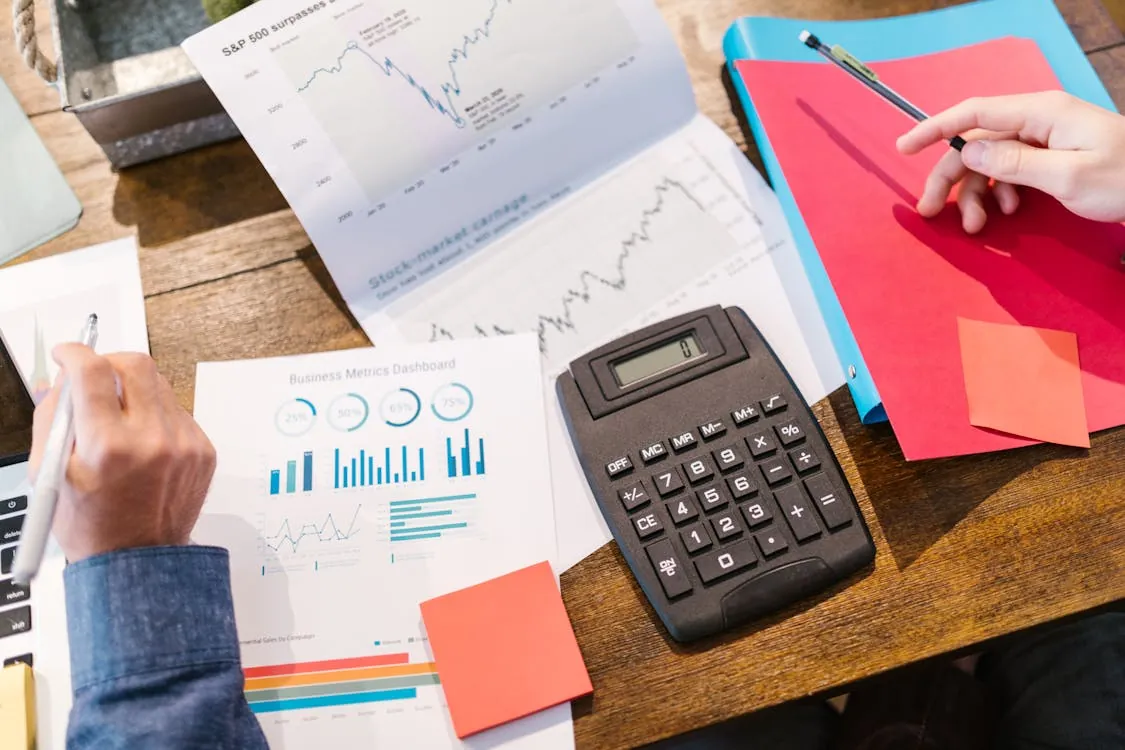 Financial analysis tools and charts illustrating AI funding and valuation comparisons in 2026