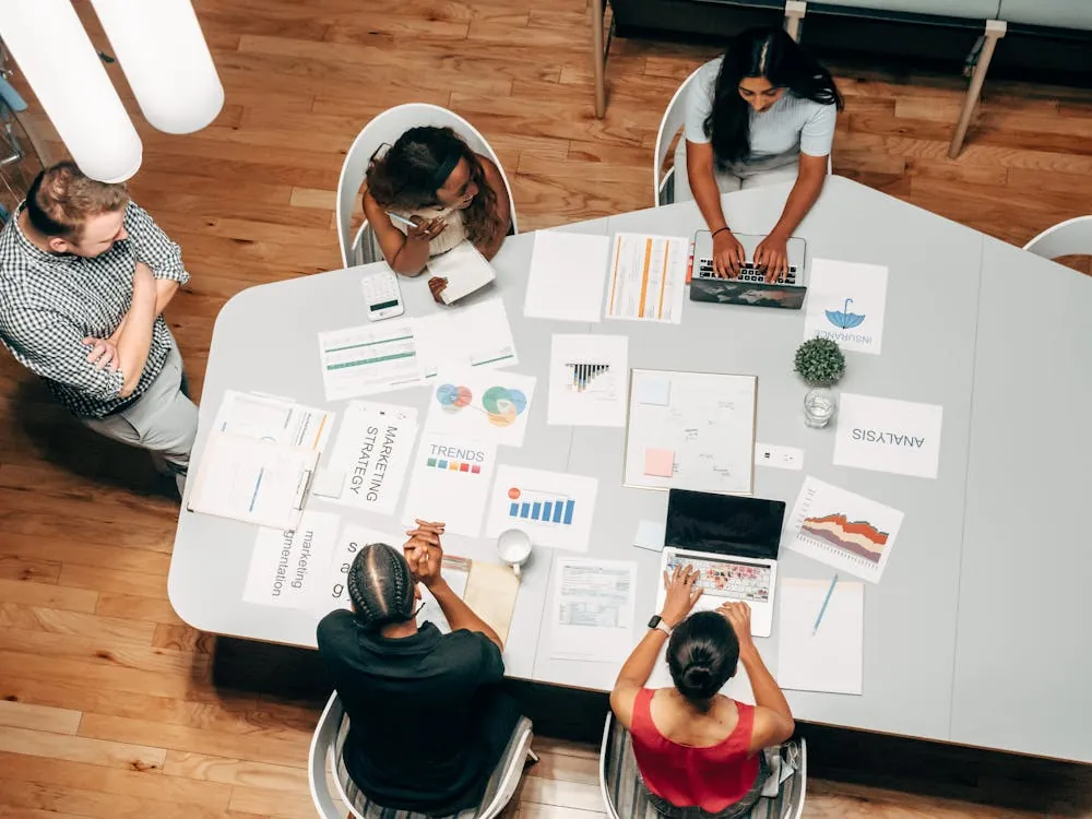 Marketing team analyzing AI-driven personalization data