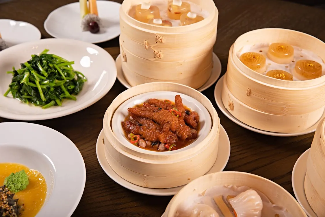 Cantonese dim sum served in traditional bamboo steamers