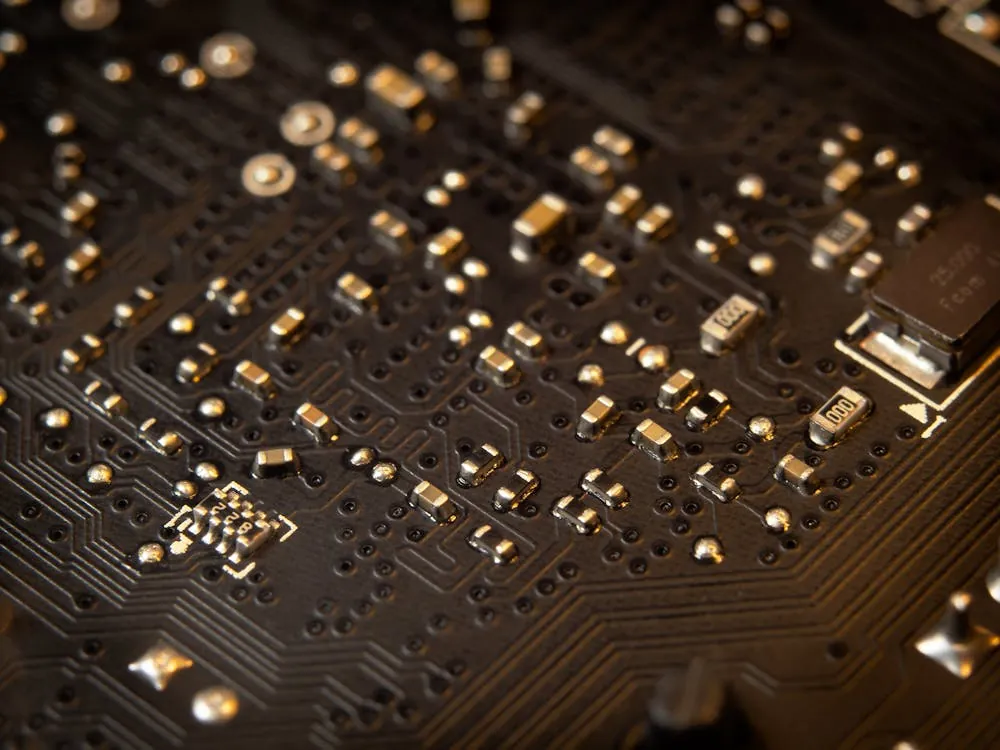 Closeup of microprocessor circuit board, illustrating physical hardware that inspired projects like z386.