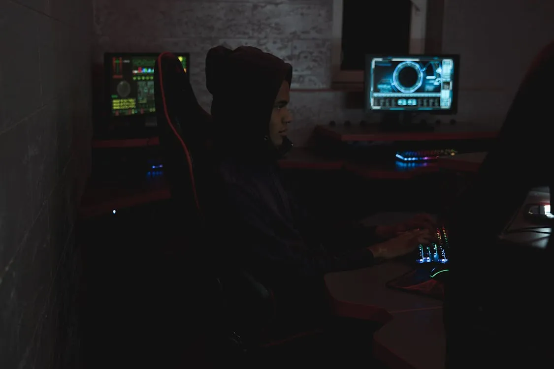 Cybersecurity operations center monitoring software security threats and breaches.