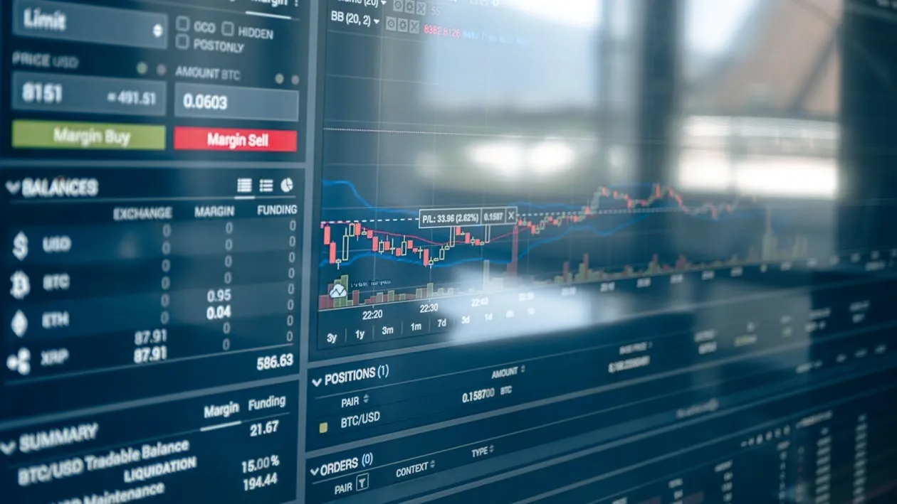 Trading screens showing stock market data and price movement
