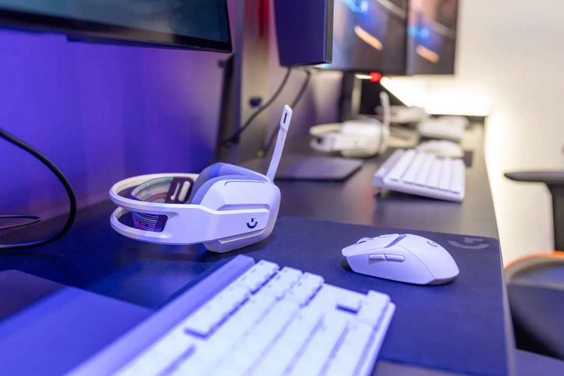 Modern gaming hardware setup with console and PC