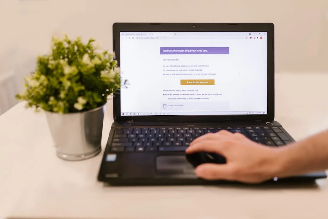 Phishing email victim reading suspicious message