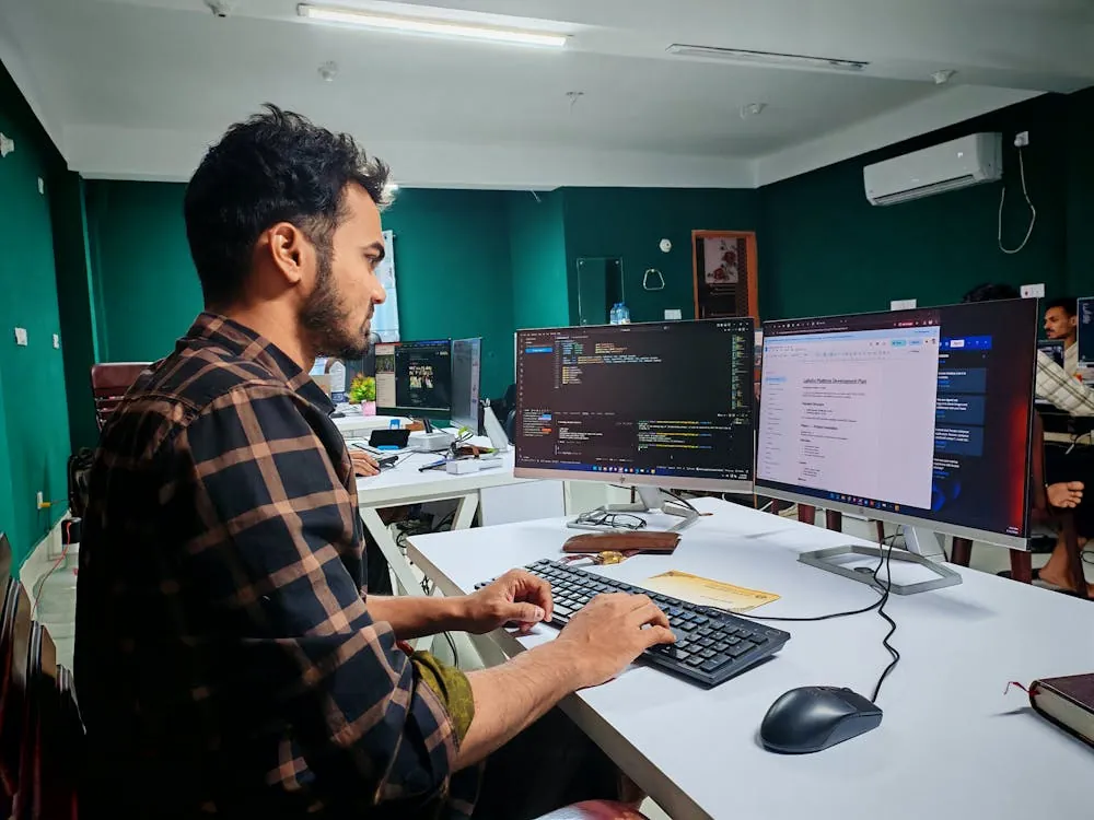 Software engineers collaborating in modern office environment