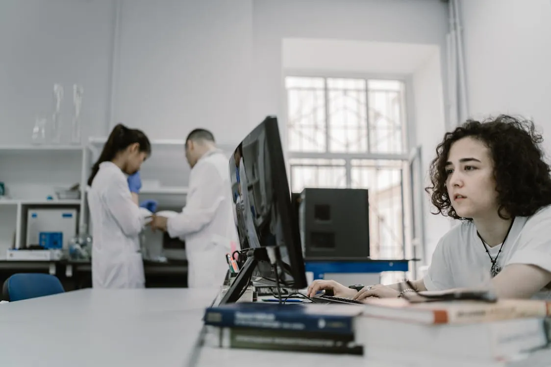 Researchers working on AI models in a computer laboratory