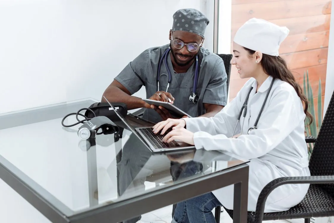 Apple Business Manager integration workflow for healthcare device enrollment and management