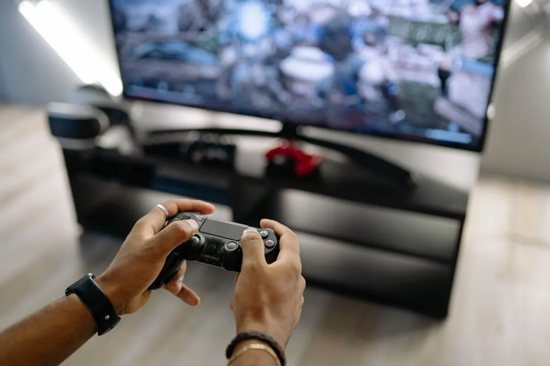 Compact gaming PC cube in living room entertainment center