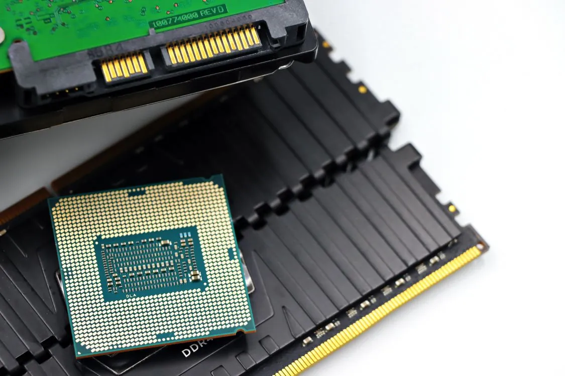Computer motherboard with CPU socket and DDR5 RAM modules for AI inference workstation build