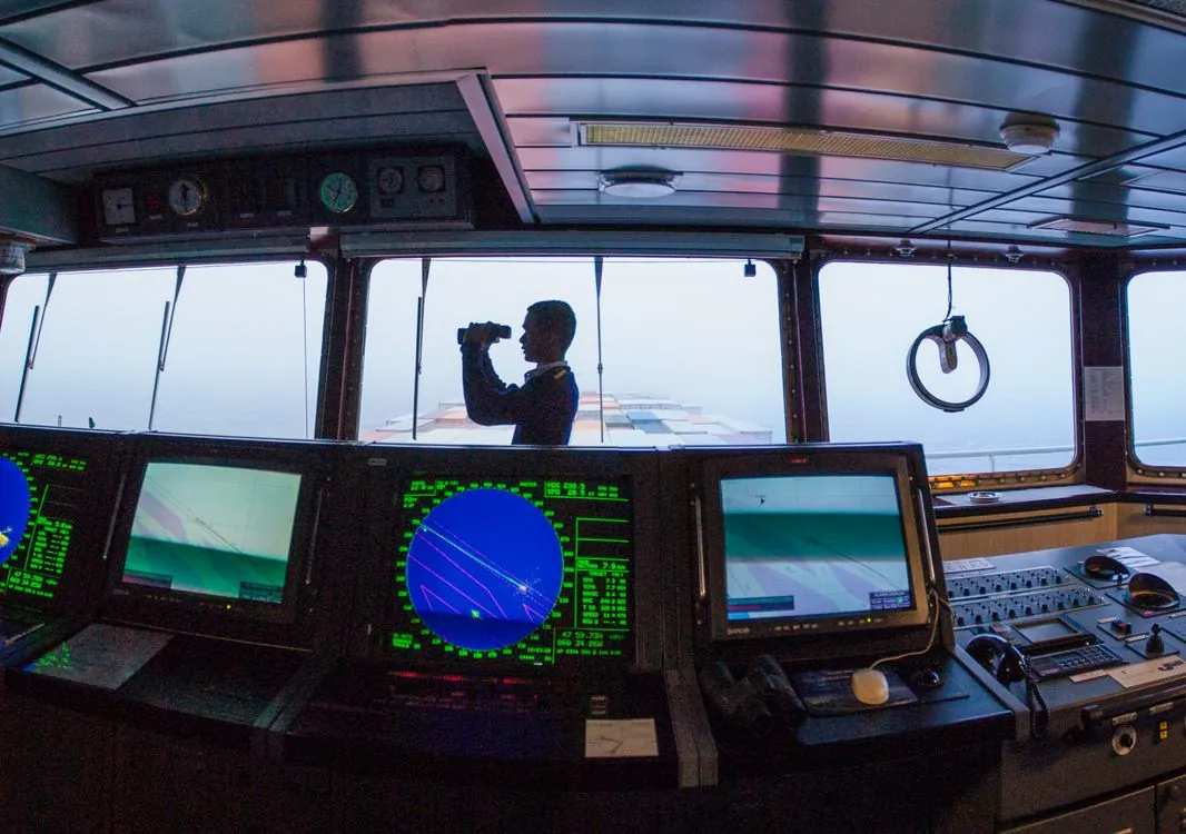 Ship navigation bridge with GPS chart plotter and radar displays