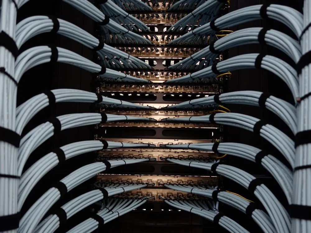 Organized data center server room with cable management