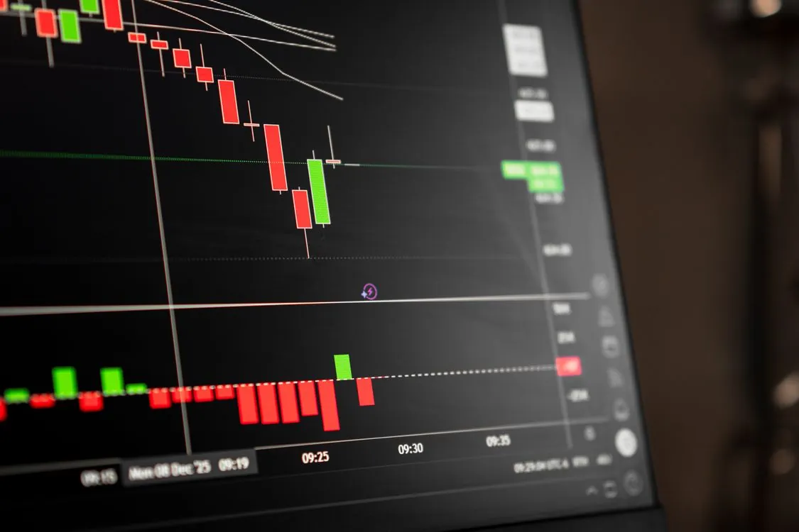Stock market chart on trading desk for investor analysis article