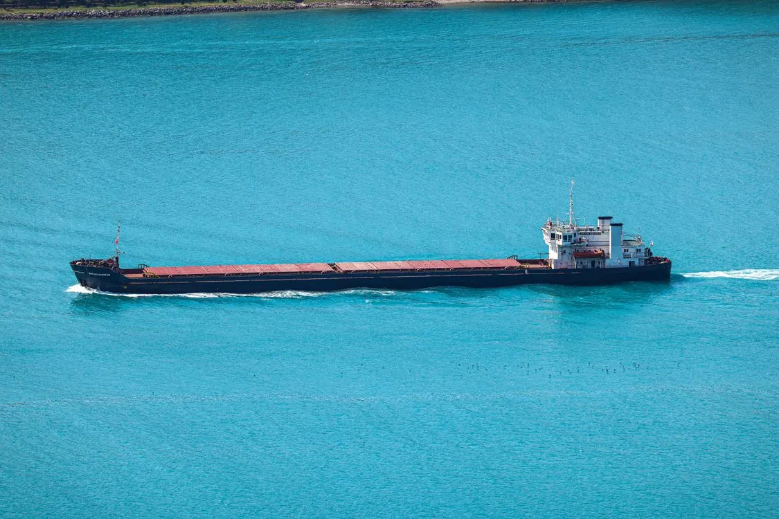 Cargo vessel at sea illustrating the 2026 timeline of events
