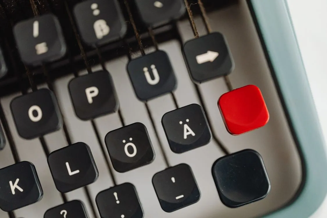 Close up of vintage typewriter keyboard showing the number sign key