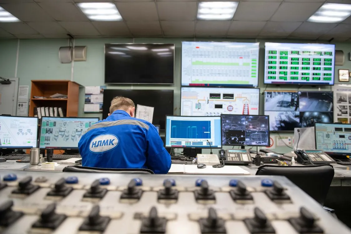 Security professionals monitoring screens in a cybersecurity operations center