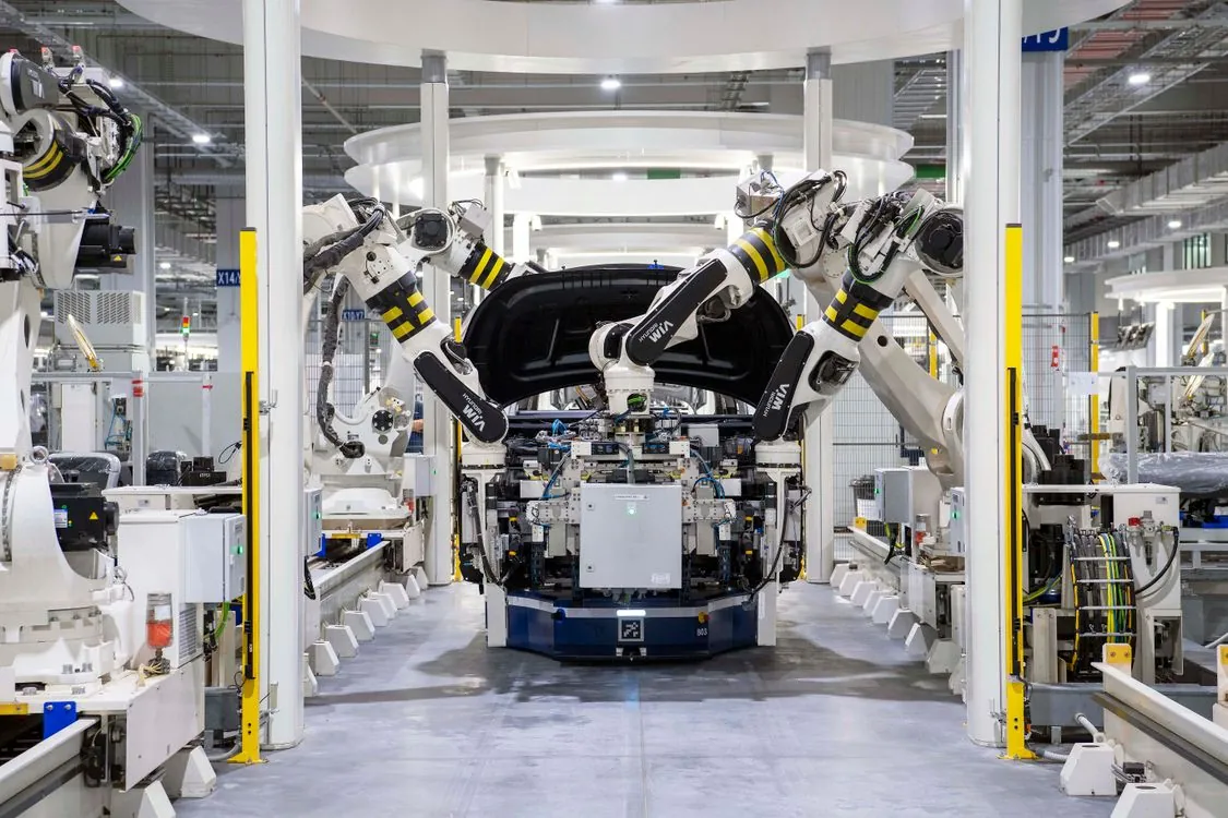 Multiple collaborative robots working together in industrial automation setting