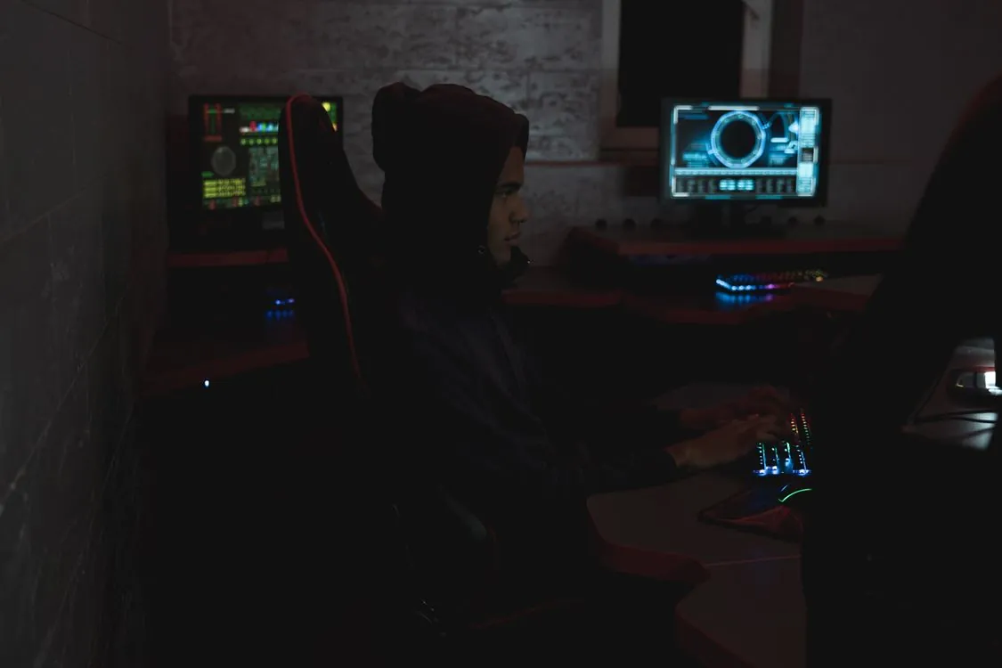Cybersecurity operations center with market screens