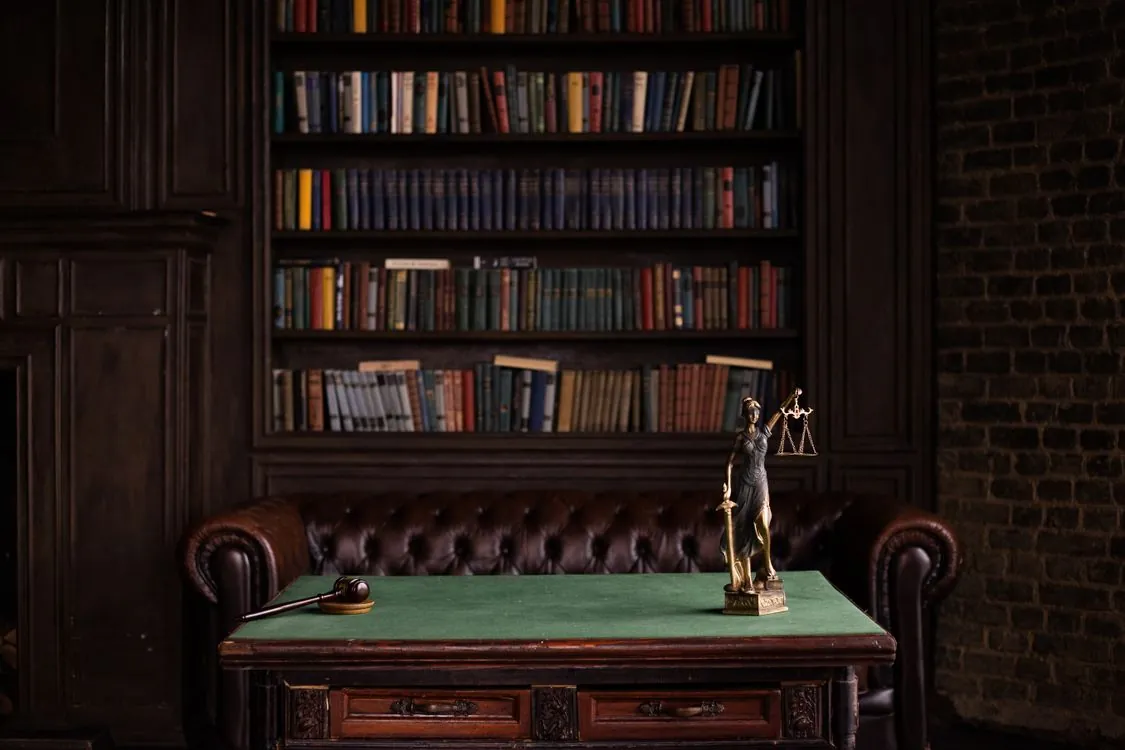 Legal gavel and data privacy law books on table