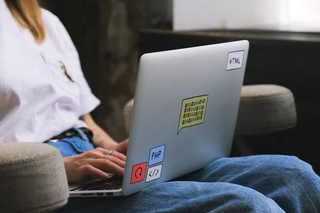 Developer running local AI inference on laptop with terminal visible