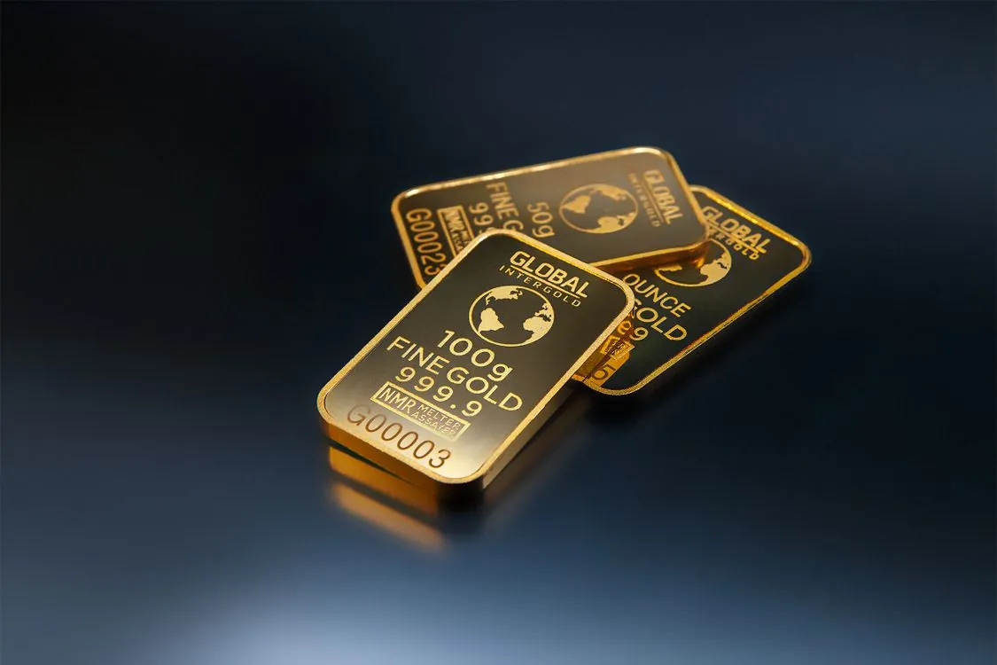 Gold bars representing gold investment and commodity markets