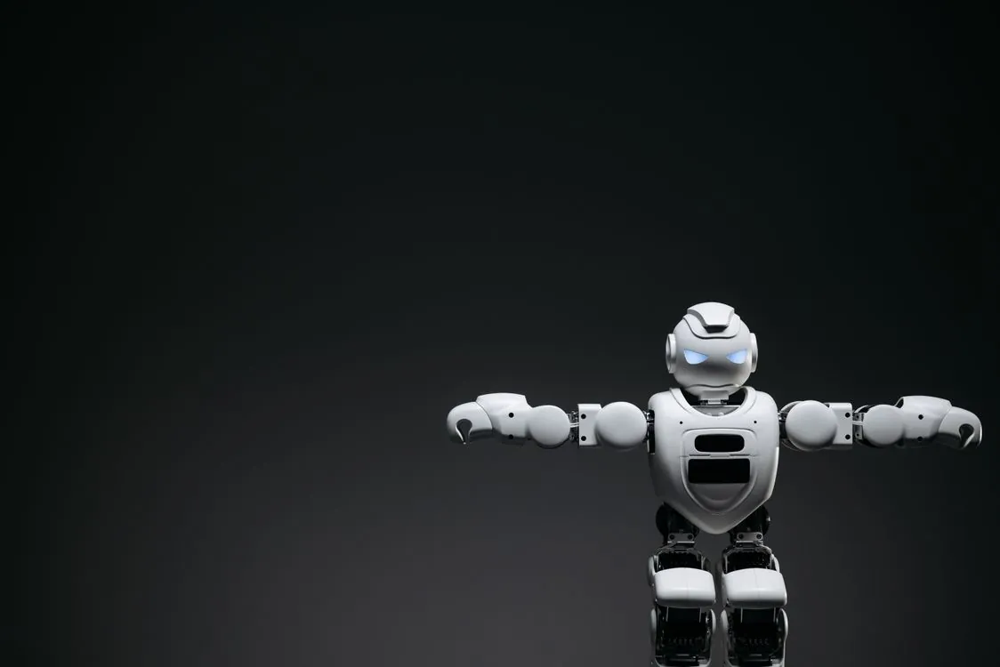 Humanoid robot with multi-finger hands performing dexterous manipulation task