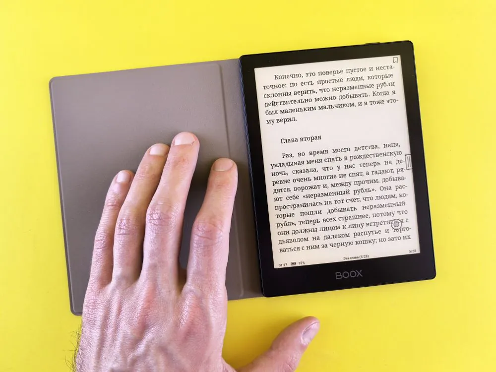 Person using tablet and smartphone for digital connectivity and file transfer