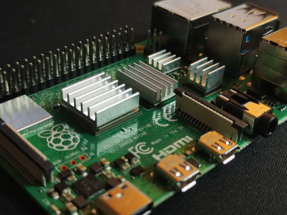 Raspberry Pi connected to wiring on workshop bench