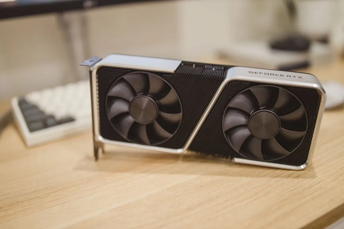 Nvidia GeForce RTX 5090 graphics card installed in a PC motherboard with cooling system