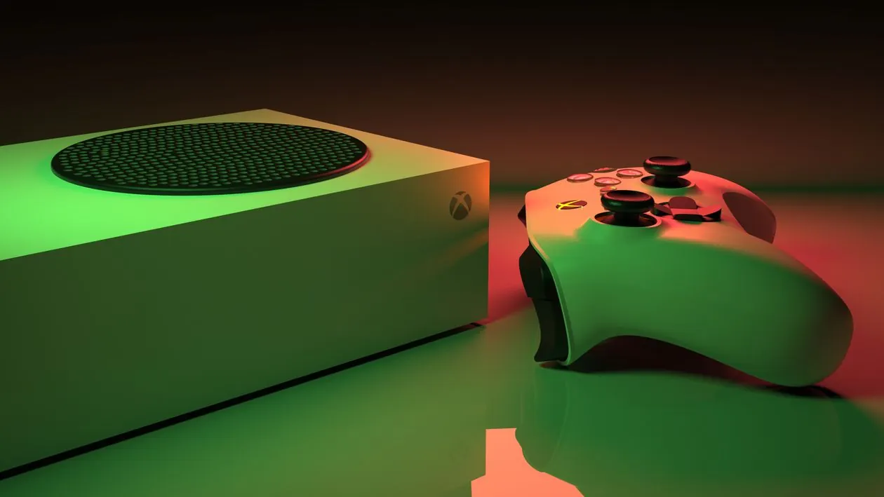 Xbox Series X console on desk with gaming monitor and controller