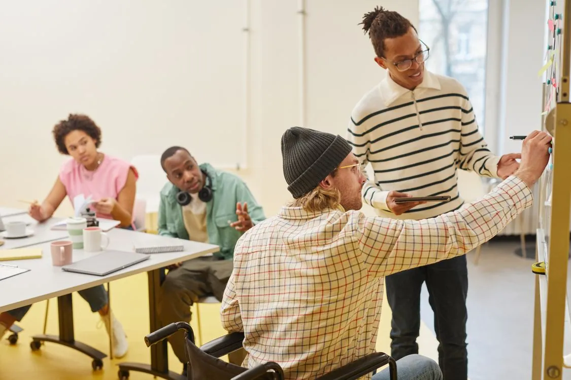 Diverse team collaborating in modern office