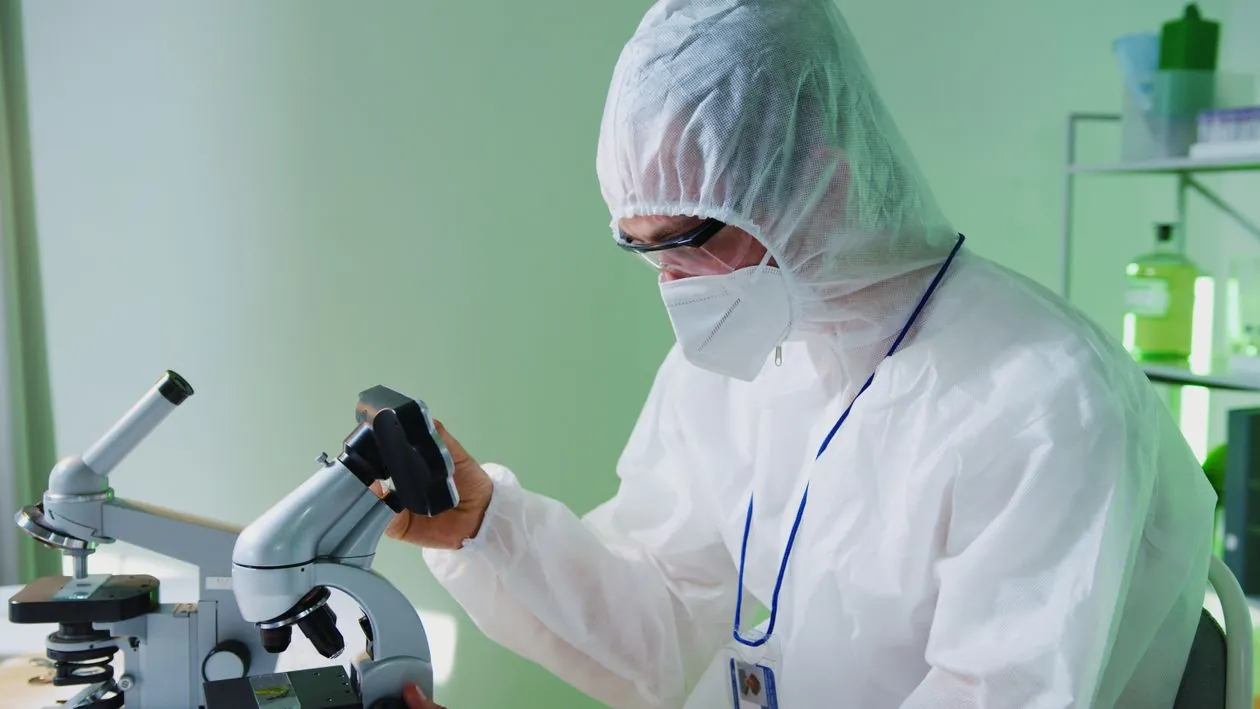 Scientists conducting cancer immunotherapy research in a biotechnology laboratory