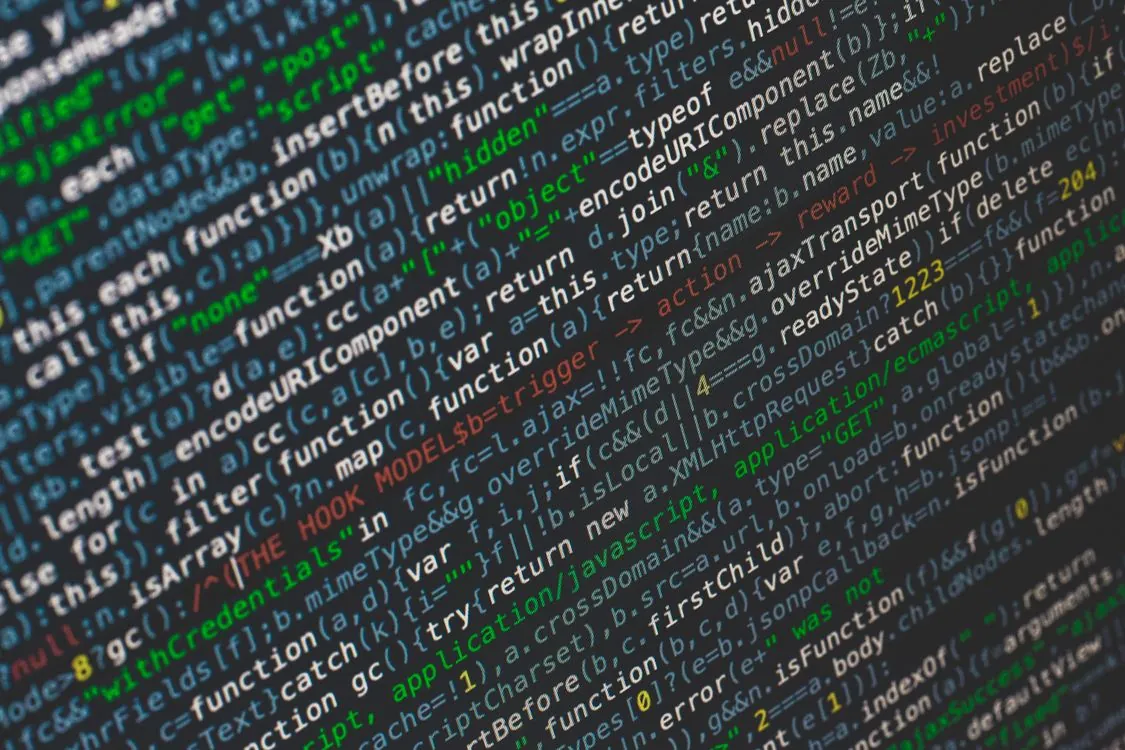 Developer writing virtualization and container code on screen