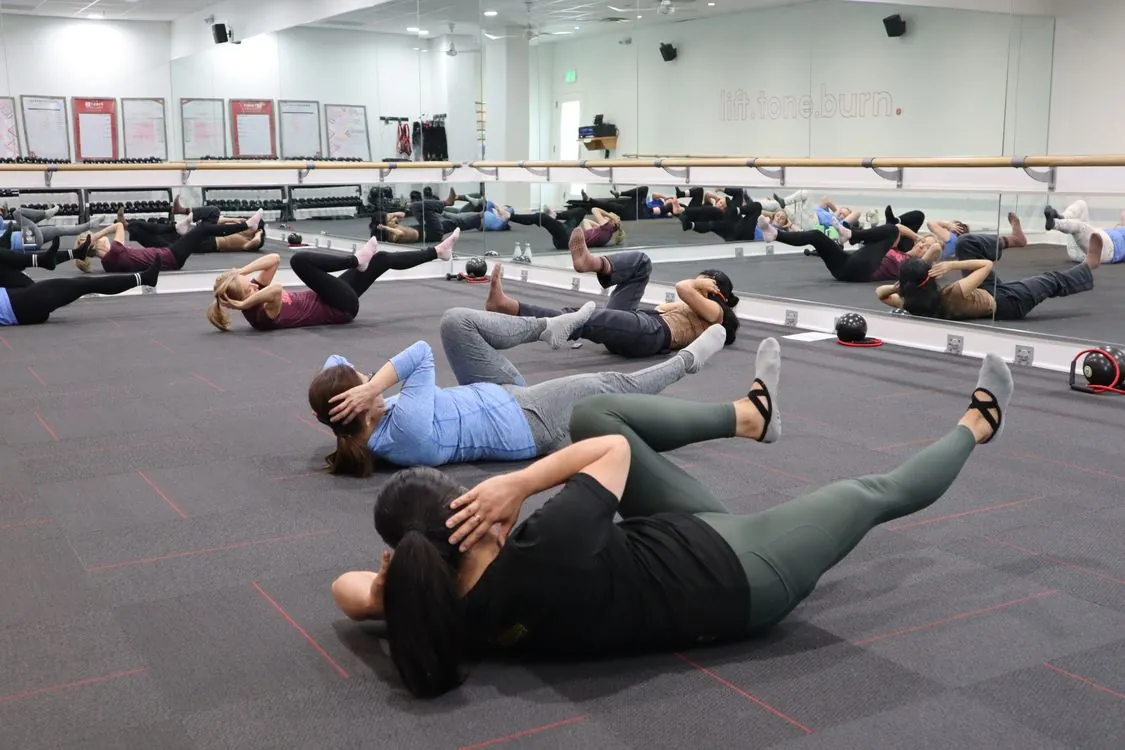 Modern gym fitness studio with workout equipment
