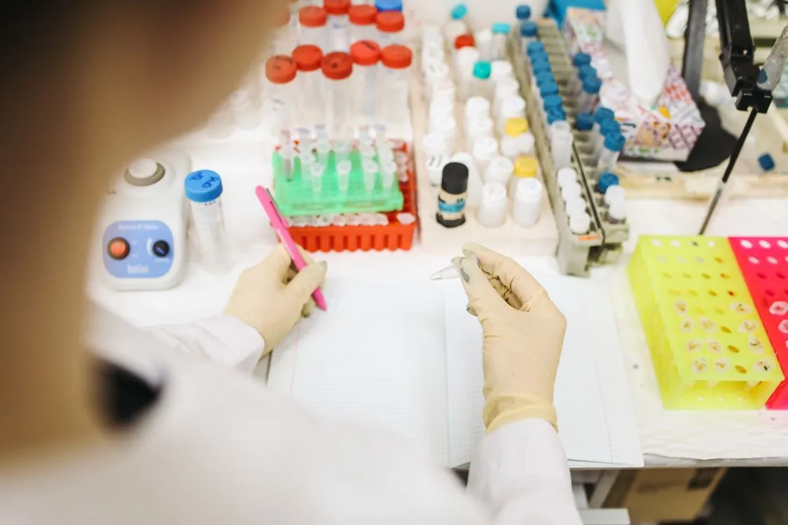 Medical research team reviewing cancer treatment data in a clinical setting