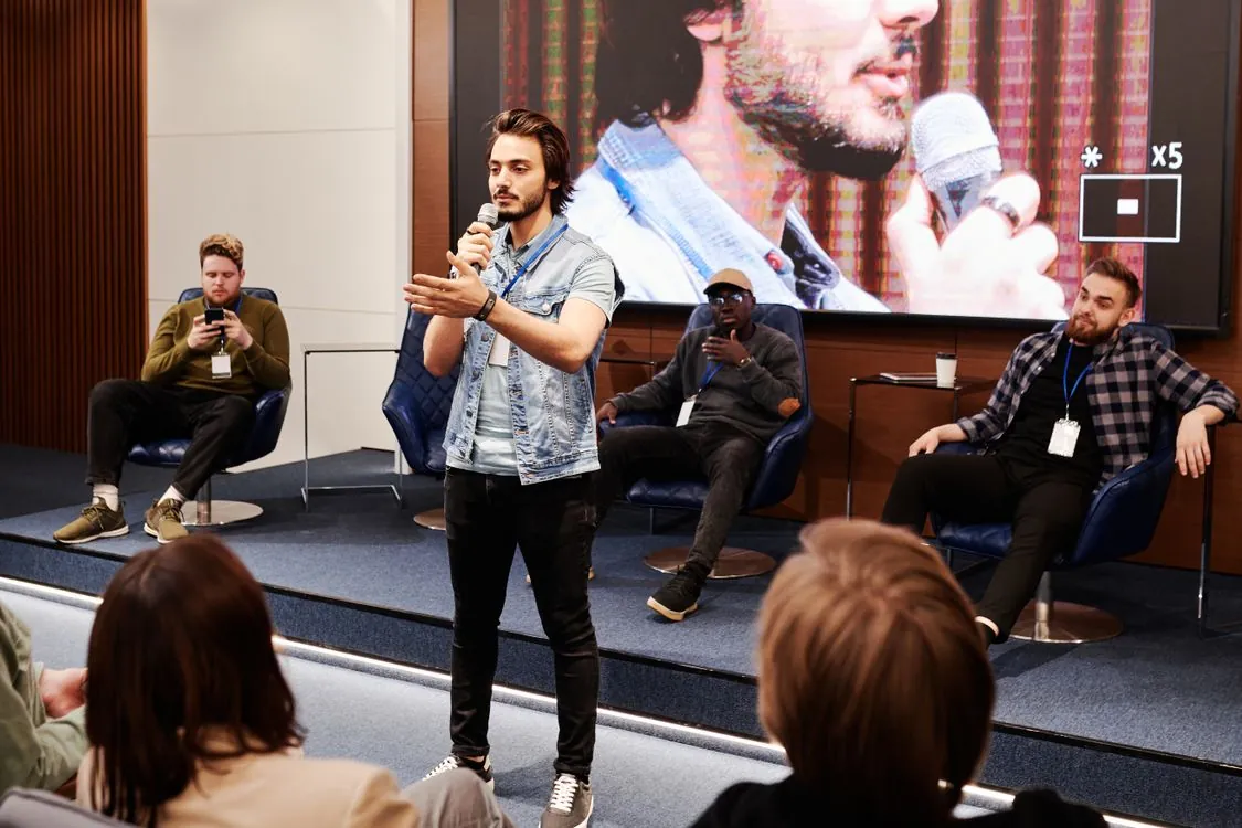 Speaker presenting at Mistral AI Now Summit in Paris