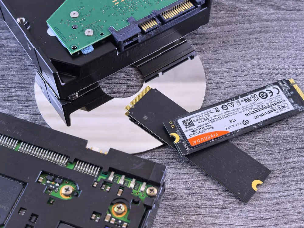 NVMe SSD next to hard drive on a table