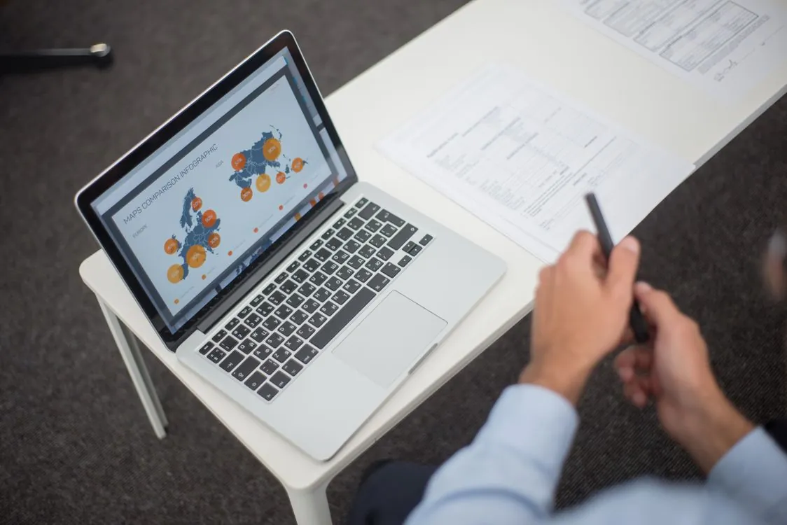 Developer editing map data on a laptop in the iD editor