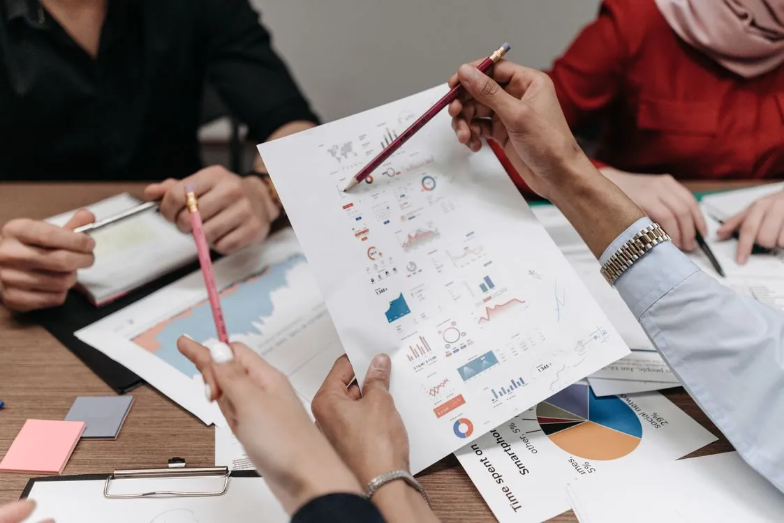 Business team reviewing AI agent risk in an office meeting