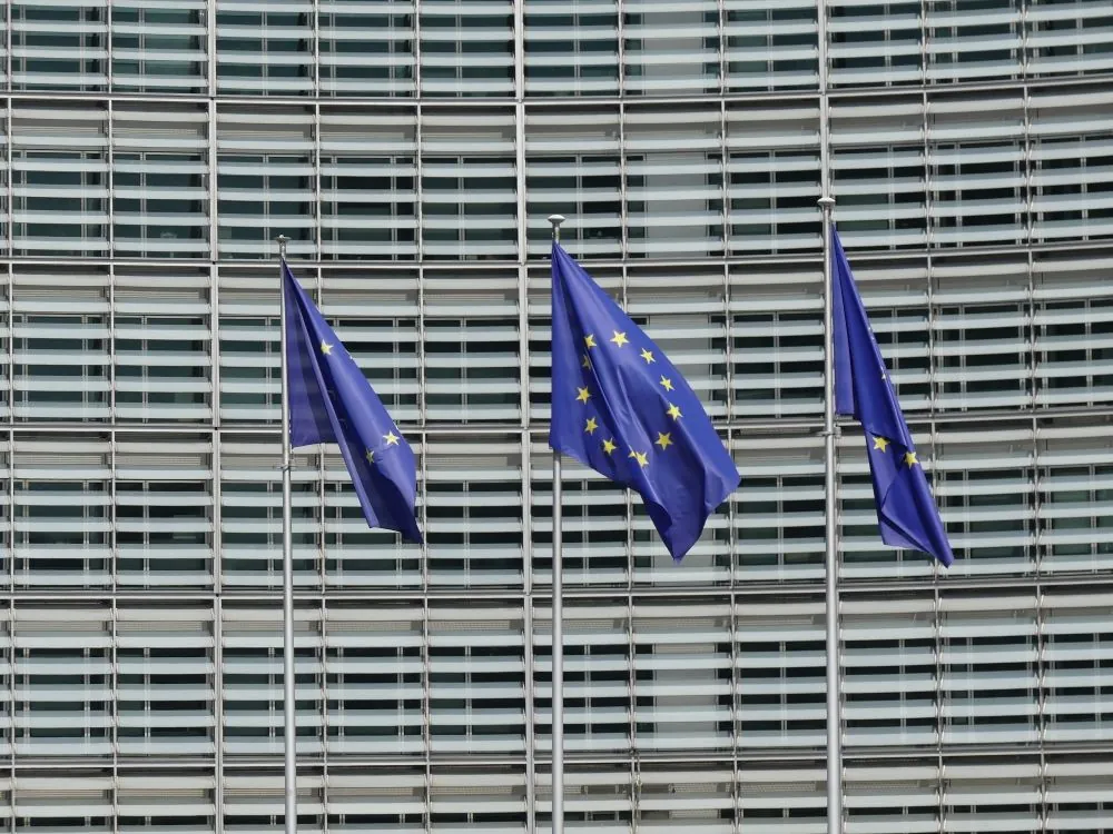 European Union flags outside an EU institutional building in Brussels