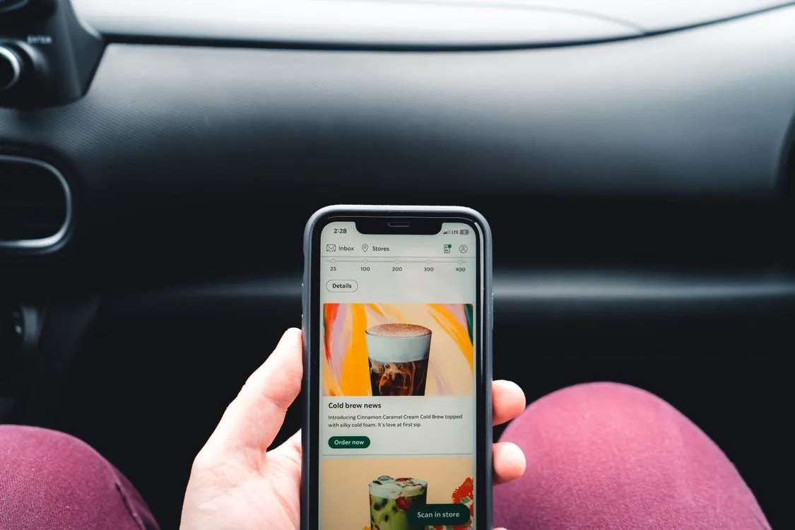 Smartphone displaying mobile shopping app interface