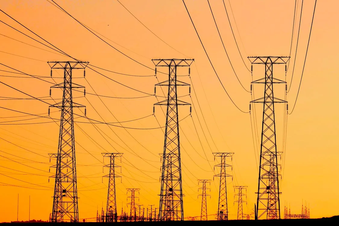 High-voltage power transmission lines and electrical grid infrastructure vulnerable to hurricane winds
